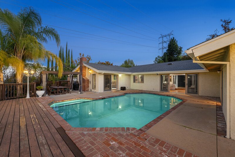 Casa de un solo nivel con alberca en patio trasero en Puebla, México